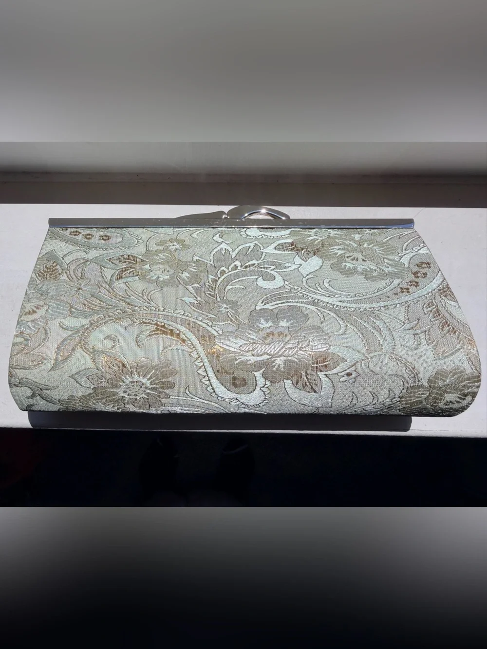 Viintage-style evening clutch features gold/green floral damask metal kiss lock